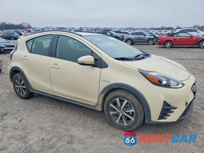 Czwarte zdjęcie samochodu z boku: 2018 TOYOTA PRIUS C TWO VIN:JTDKDTB33J1616504 - miniatura