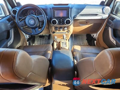 Zdjęcie 8 z 14 samochodu: 2012 JEEP WRANGLER UNLIMITED SAHARA VIN:1C4HJWEG9CL279685 - miniatura