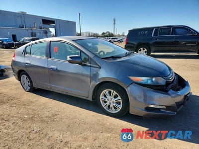 Czwarte zdjęcie samochodu z boku: 2010 HONDA INSIGHT EX VIN:JHMZE2H70AS020548 - miniatura