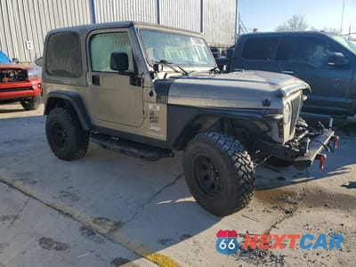 Czwarte zdjęcie samochodu z boku: 2003 JEEP WRANGLER COMMANDO VIN:1J4FA39S63P312343 - miniatura