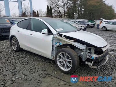 Czwarte zdjęcie samochodu z boku: 2023 TESLA MODEL Y VIN:7SAYGDEE8PA093243 - miniatura