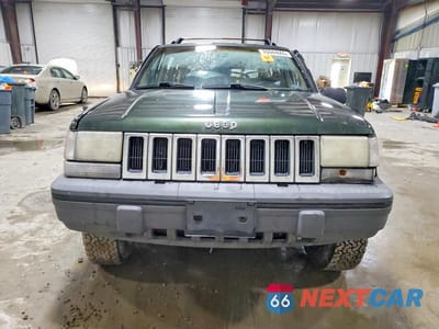 Piąte zdjęcie samochodu w środku: 1995 JEEP GRAND CHEROKEE LAREDO VIN:1J4GZ58S0SC612881 - miniatura