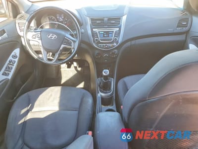 Zdjęcie 8 z 12 samochodu: 2015 HYUNDAI ACCENT SPORT VIN:KMHCU5AE5FU225679 - miniatura