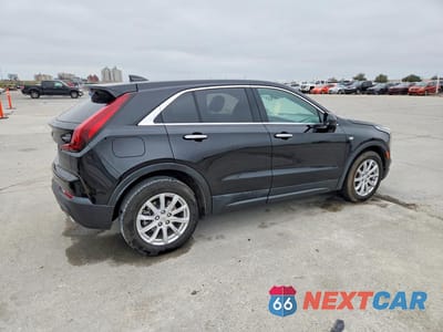 Trzecie zdjęcie samochodu z tyłu: 2021 CADILLAC XT4 LUXURY VIN:1GYAZAR4XMF026799 - miniatura