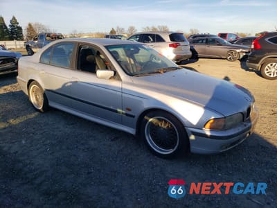 Czwarte zdjęcie samochodu z boku: 2000 BMW 5 SERIES VIN:WBADM6341YGV00658 - miniatura