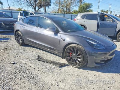 Czwarte zdjęcie samochodu z boku: 2021 TESLA MODEL 3 VIN:5YJ3E1EC0MF914411 - miniatura