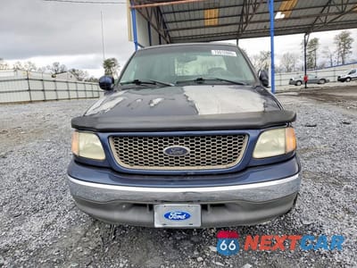 Piąte zdjęcie samochodu w środku: 2002 FORD F-150 VIN:1FTRX17W22NB57005 - miniatura
