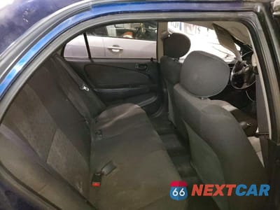 Zdjęcie 10 z 11 samochodu: 2001 TOYOTA COROLLA S VIN:1NXBR12E51Z552323 - miniatura