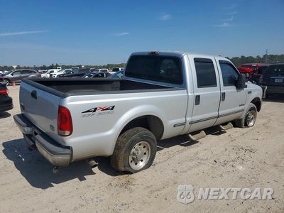 Trzecie zdjęcie samochodu z tyłu: 1999 FORD F250 SUPER DUTY VIN:1FTNW21F0XEC65002 - miniatura