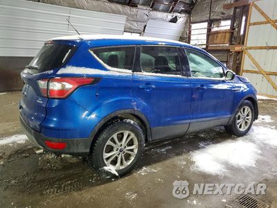 Trzecie zdjęcie samochodu z tyłu: 2017 FORD ESCAPE SE VIN:1FMCU0G99HUE28915 - miniatura