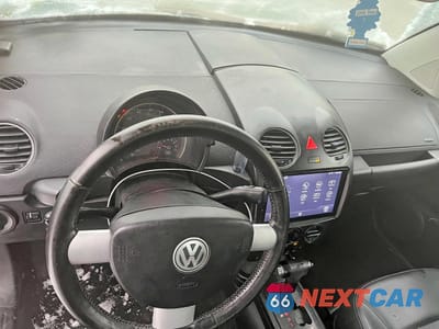 Zdjęcie 9 z 11 samochodu: 2010 VOLKSWAGEN NEW BEETLE VIN:3VWRW3AG2AM015792 - miniatura