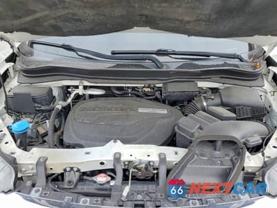 Zdjęcie 12 z 13 samochodu: 2019 HONDA PILOT TOURING VIN:5FNYF5H67KB002002 - miniatura