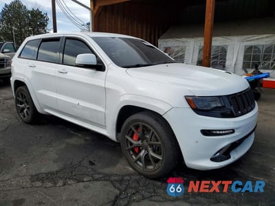 Czwarte zdjęcie samochodu z boku: 2014 JEEP GRAND CHEROKEE SRT-8 VIN:1C4RJFDJ2EC236536 - miniatura