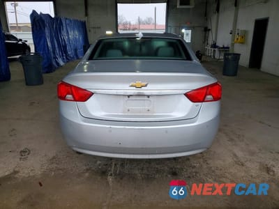 Zdjęcie 6 z 12 samochodu: 2014 CHEVROLET IMPALA LT VIN:2G1115SL2E9266664 - miniatura