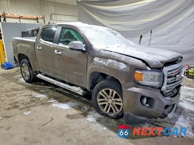 Czwarte zdjęcie samochodu z boku: 2016 GMC CANYON SLT VIN:1GTG6DE38G1272369 - miniatura