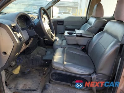 Zdjęcie 7 z 12 samochodu: 2004 FORD F150 VIN:1FTVX12584NC11648 - miniatura