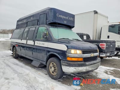 Czwarte zdjęcie samochodu z boku: 2013 CHEVROLET EXPRESS G3500 LT VIN:1GBZG1FA8D1186612 - miniatura