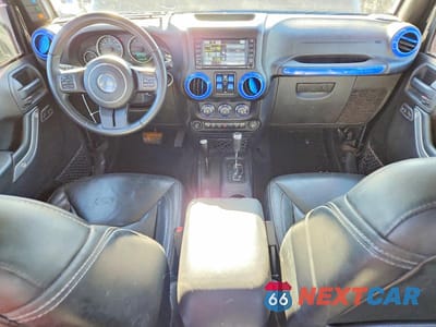 Zdjęcie 8 z 12 samochodu: 2015 JEEP WRANGLER UNLIMITED SAHARA VIN:1C4BJWEG0FL754330 - miniatura