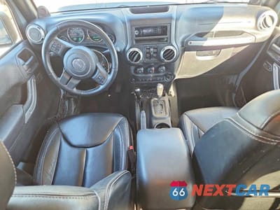 Zdjęcie 8 z 13 samochodu: 2014 JEEP WRANGLER UNLIMITED SAHARA VIN:1C4BJWEG0EL196980 - miniatura