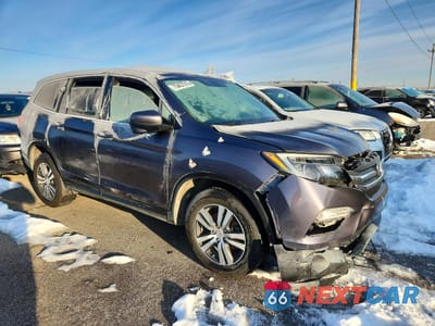 Czwarte zdjęcie samochodu z boku: 2018 HONDA PILOT EXL VIN:5FNYF6H55JB011597 - miniatura