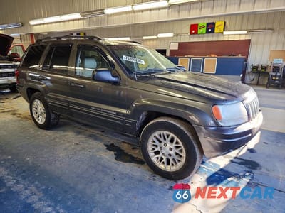 Czwarte zdjęcie samochodu z boku: 2002 JEEP GRAND CHEROKEE LIMITED VIN:1J4GW58NX2C272996 - miniatura