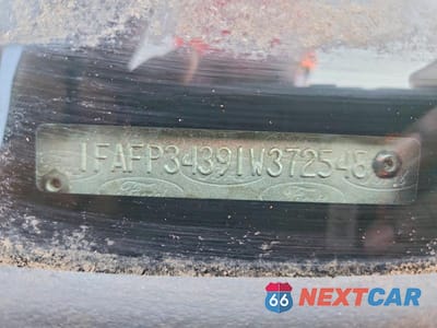 Zdjęcie 12 z 12 samochodu: 2001 FORD FOCUS SE VIN:1FAFP34391W372548 - miniatura