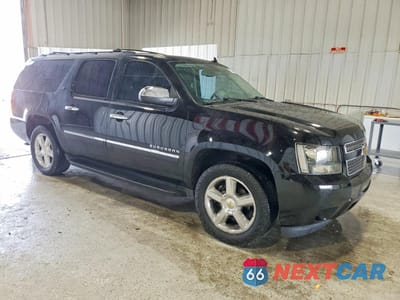 Czwarte zdjęcie samochodu z boku: 2011 CHEVROLET SUBURBAN K1500 LTZ VIN:1GNSKKE30BR230225 - miniatura