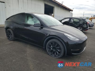 Czwarte zdjęcie samochodu z boku: 2022 TESLA MODEL Y VIN:7SAYGDEE7NF417881 - miniatura