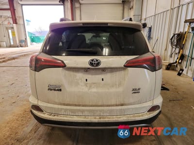 Zdjęcie 6 z 12 samochodu: 2017 TOYOTA RAV4 XLE VIN:JTMRFREV6HJ111592 - miniatura