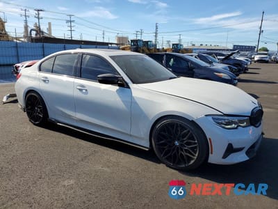 Czwarte zdjęcie samochodu z boku: 2021 BMW 330E VIN:3MW5P7J09M8B74277 - miniatura