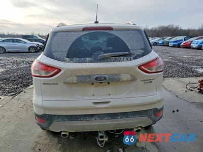 Zdjęcie 6 z 11 samochodu: 2016 FORD ESCAPE TITANIUM VIN:1FMCU9J94GUC42484 - miniatura