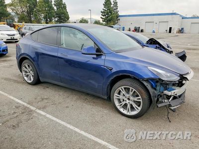 Czwarte zdjęcie samochodu z boku: 2023 TESLA MODEL Y VIN:7SAYGDED8PF957377 - miniatura