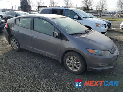 Czwarte zdjęcie samochodu z boku: 2010 HONDA INSIGHT EX VIN:JHMZE2H76AS025687 - miniatura