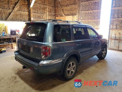 Trzecie zdjęcie samochodu z tyłu: 2006 HONDA PILOT EX VIN:2HKYF18436H521109 - miniatura