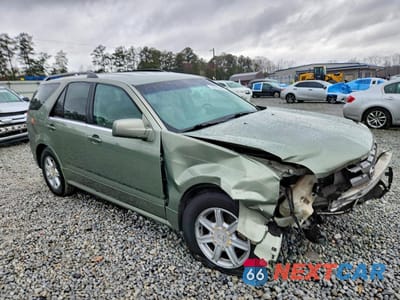 Czwarte zdjęcie samochodu z boku: 2004 CADILLAC SRX VIN:1GYEE637540188503 - miniatura