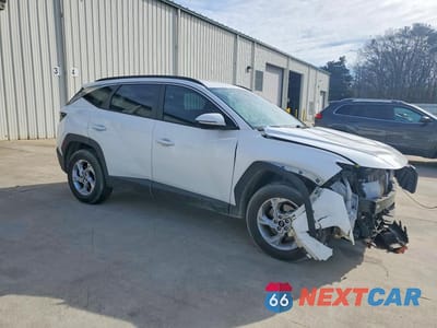 Czwarte zdjęcie samochodu z boku: 2023 HYUNDAI TUCSON SEL VIN:5NMJBCAE0PH265683 - miniatura