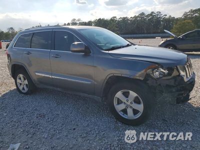 Czwarte zdjęcie samochodu z boku: 2012 JEEP GRAND CHEROKEE LAREDO VIN:1C4RJFAG2CC150584 - miniatura