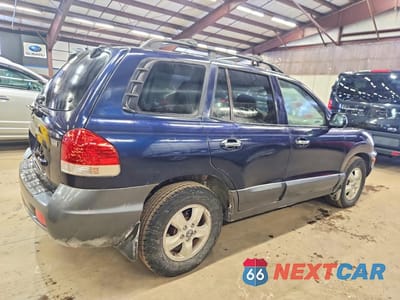 Piąte zdjęcie samochodu w środku: 2005 HYUNDAI SANTA FE GLS VIN:KM8SC73E95U960607 - miniatura