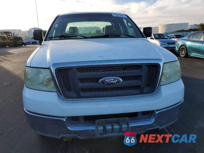 Piąte zdjęcie samochodu w środku: 2004 FORD F150 VIN:1FTVX12584NC11648 - miniatura