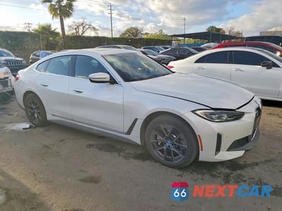 Czwarte zdjęcie samochodu z boku: 2024 BMW I4 EDRIVE 35 VIN:WBY43AW04RFS05402 - miniatura