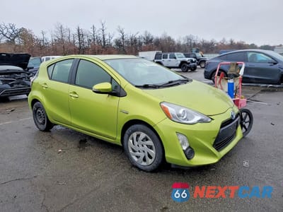 Czwarte zdjęcie samochodu z boku: 2015 TOYOTA PRIUS C VIN:JTDKDTB31F1105056 - miniatura