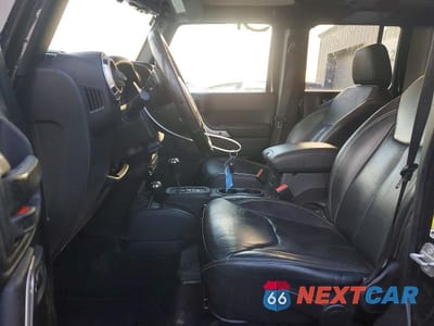 Zdjęcie 7 z 11 samochodu: 2017 JEEP WRANGLER UNLIMITED SAHARA VIN:1C4BJWEG5HL723013 - miniatura