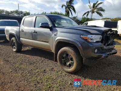 Czwarte zdjęcie samochodu z boku: 2023 TOYOTA TACOMA VIN:3TMCZ5AN9PM599255 - miniatura