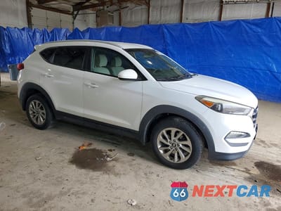 Czwarte zdjęcie samochodu z boku: 2016 HYUNDAI TUCSON LIMITED VIN:KM8J3CA47GU035373 - miniatura
