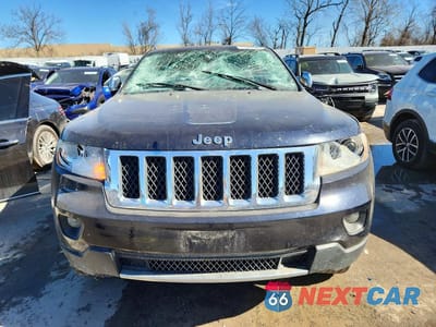 Piąte zdjęcie samochodu w środku: 2011 JEEP GRAND CHEROKEE OVERLAND VIN:1J4RR6GTXBC570017 - miniatura