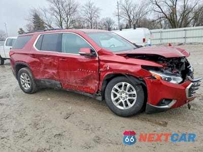 Czwarte zdjęcie samochodu z boku: 2020 CHEVROLET TRAVERSE LT VIN:1GNEVGKW6LJ296777 - miniatura