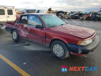 Czwarte zdjęcie samochodu z boku: 1989 TOYOTA CAMRY DLX VIN:JT2SV21E7K3372011 - miniatura