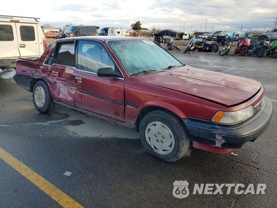 Czwarte zdjęcie samochodu z boku: 1989 TOYOTA CAMRY VIN:JT2SV21E7K3372011 - miniatura
