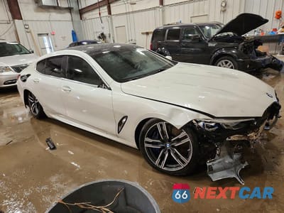 Czwarte zdjęcie samochodu z boku: 2021 BMW M850XI VIN:WBAGV8C00MCF75889 - miniatura