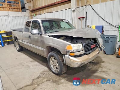 Czwarte zdjęcie samochodu z boku: 1999 GMC SIERRA VIN:1GTEK19T5XE526804 - miniatura